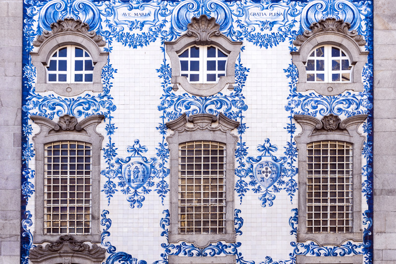 Traditional historic facade in Porto decorated with blue hand painted tin-glazed tiles, Oporto, Portugal